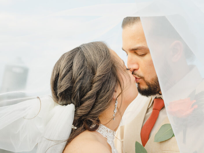 bride and groom veil